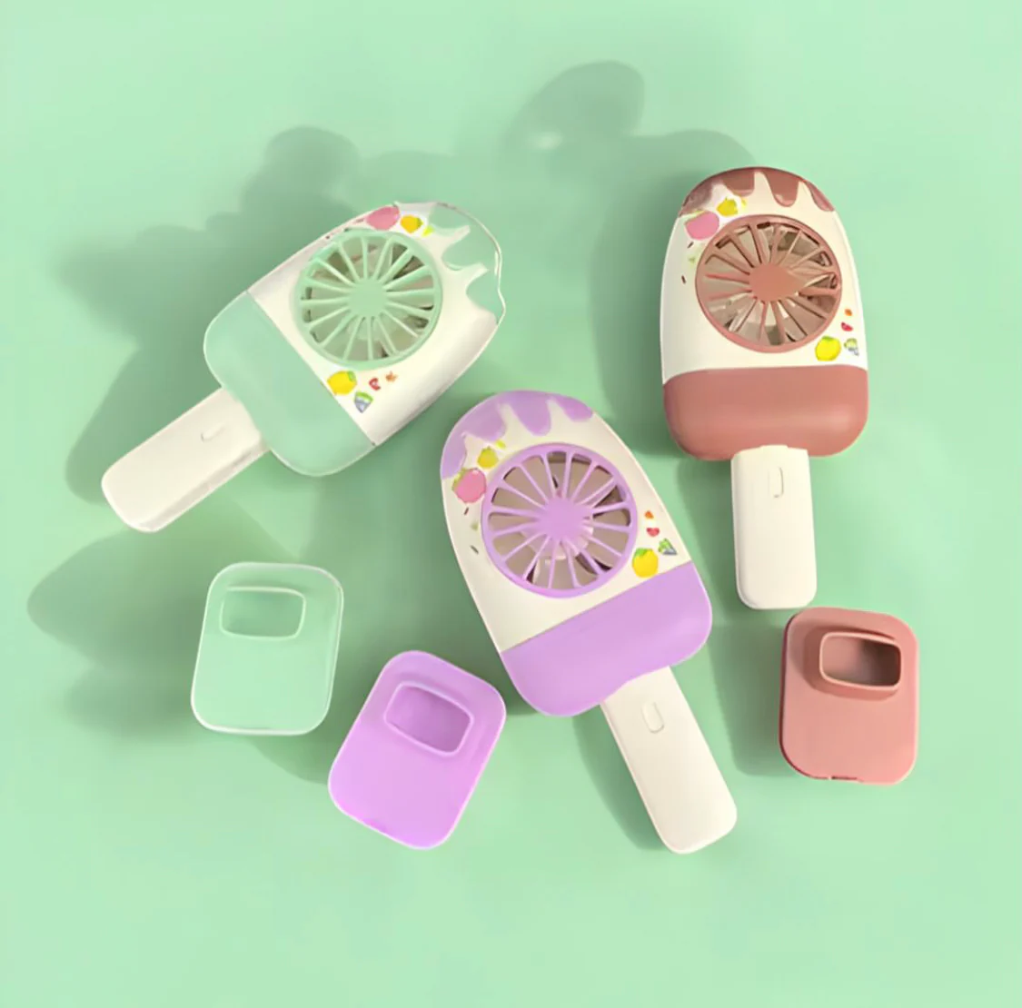 Multiple colors of mini icecream shape fan in popsicle shape available at our trusted store.
