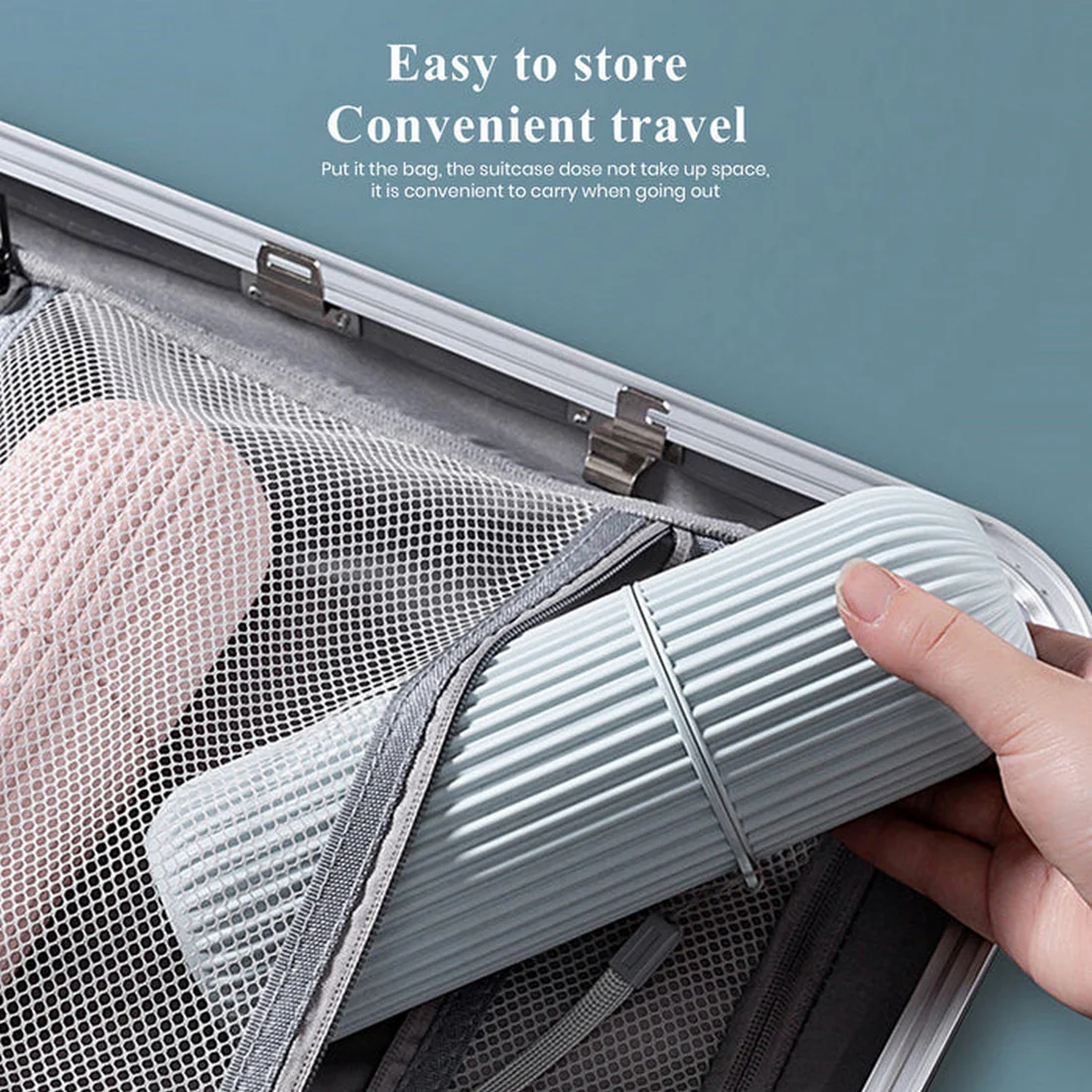 Placing a grey toothpaste case organizer into a suitcase mesh compartment to illustrate easy storage and convenient travel.