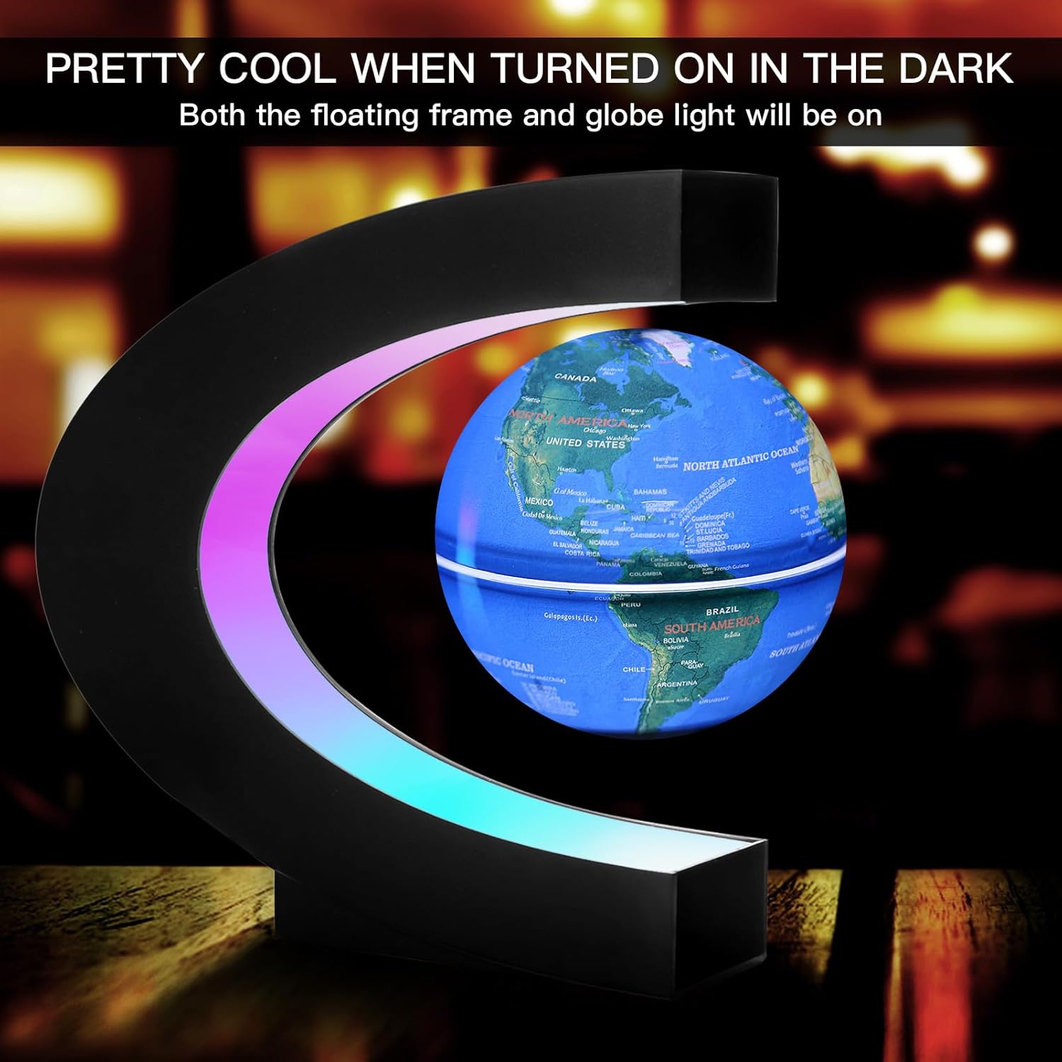 Blue C shape magnetic levitation globe glowing in the dark with multi-colored LED frame available for cash on delivery.