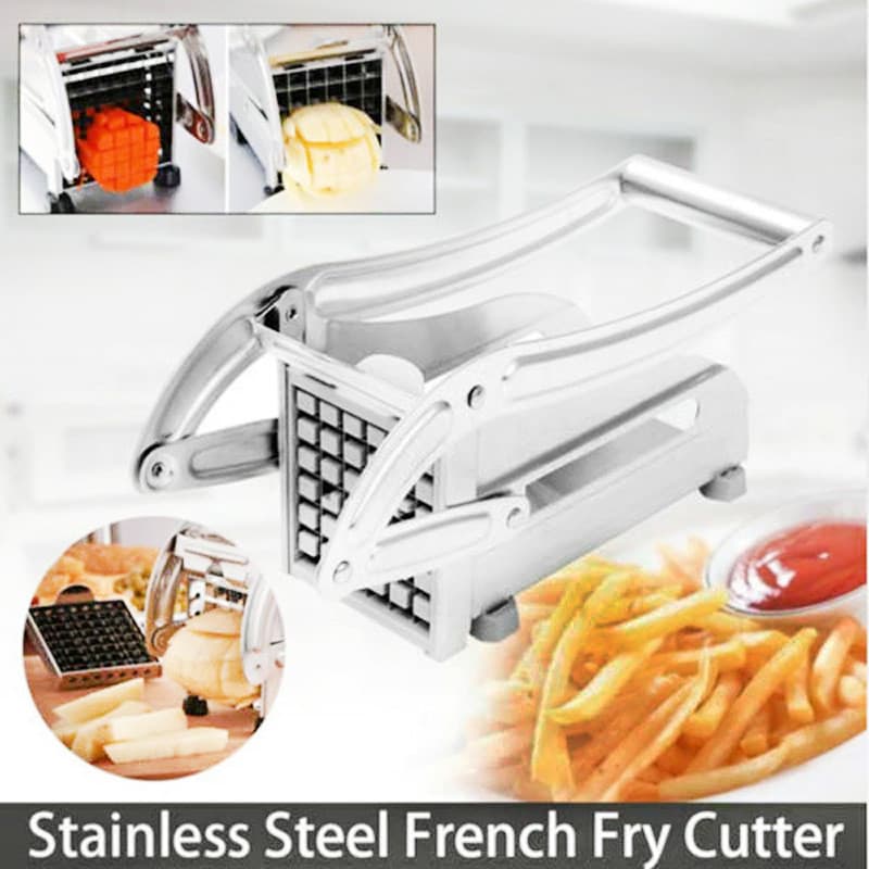 Stainless steel potato chipper being used to slice potatoes and carrots into uniform sticks for French fries.