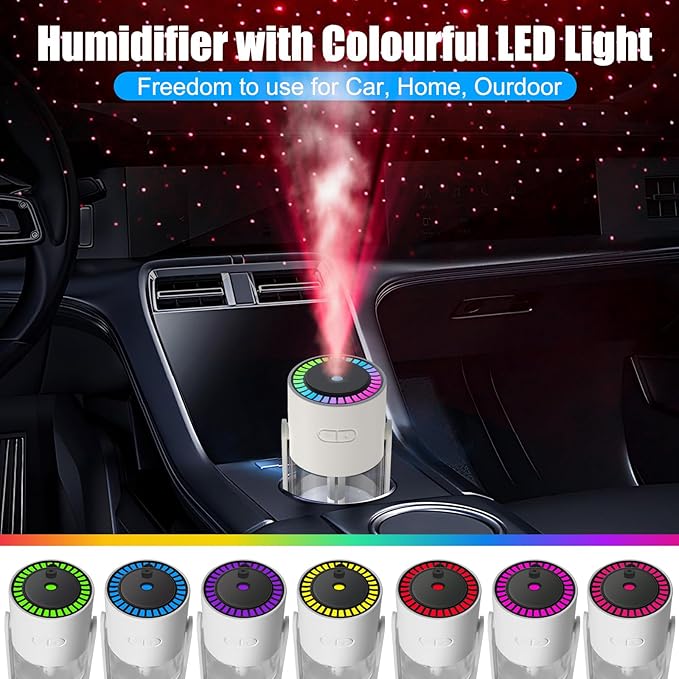 A portable star projector humidifier used in a car with red starry light projection and seven different colorful LED ring options.