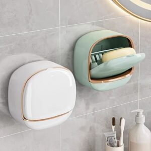 Modern wall mounted soap dish set in white and mint green colors with rose gold trim, featuring a flip-top lid and internal draining tray to keep soap dry and clean on a bathroom tile wall.